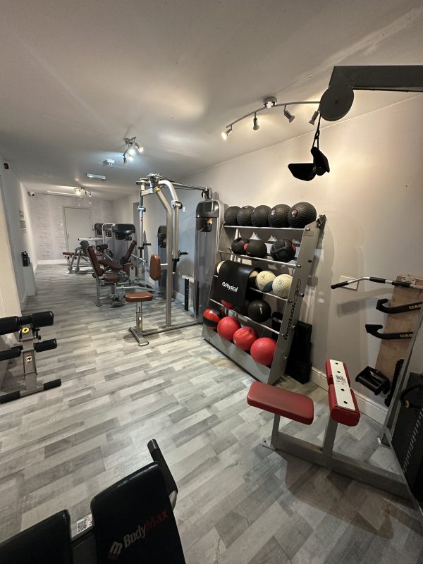 Resistance machines and a cable station