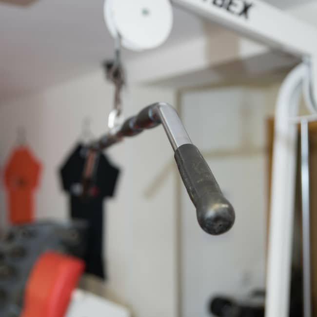 A lat pulldown handle on a cable machine