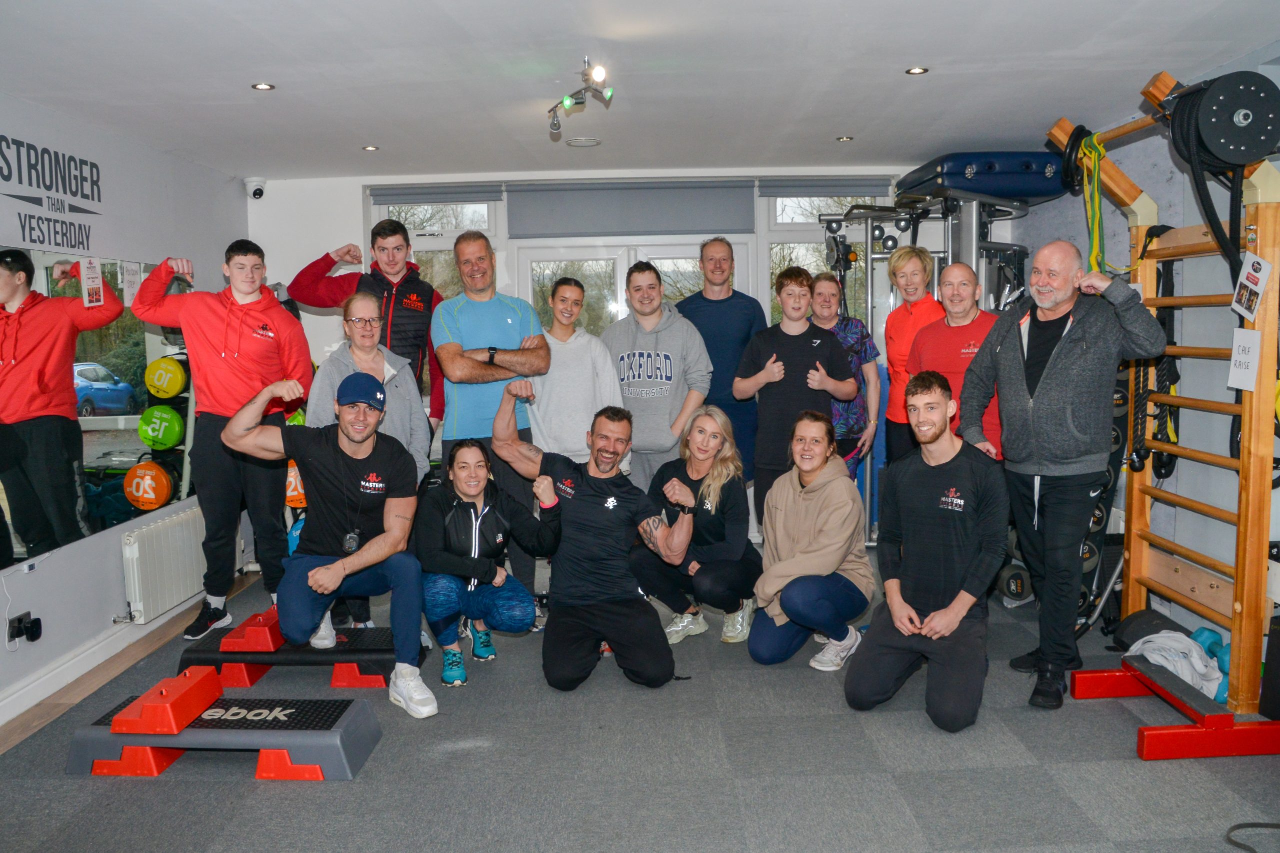 Masters Fitness members and trainers together in the gym