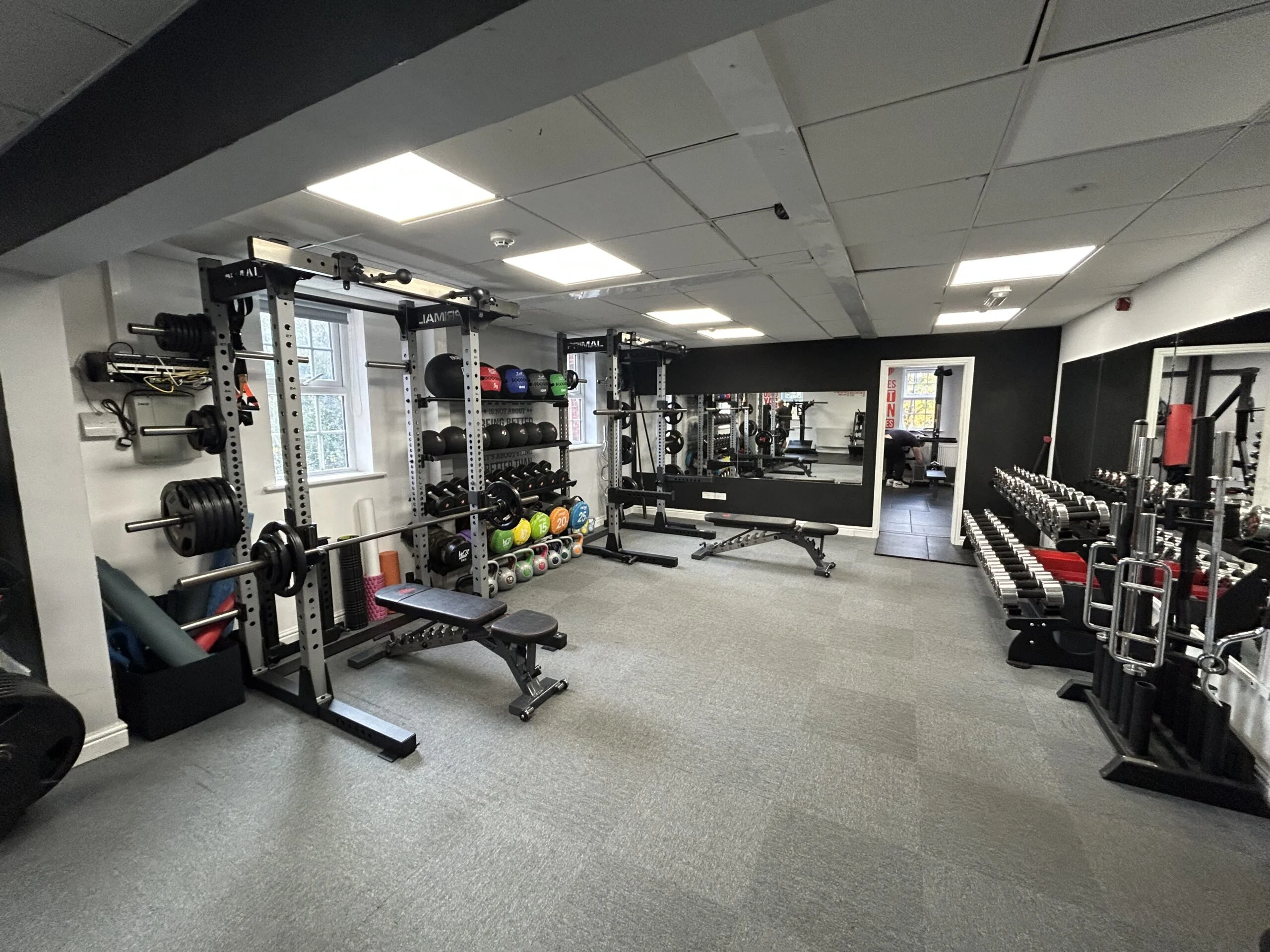 Racks, benches and dumbbells in the free weights area